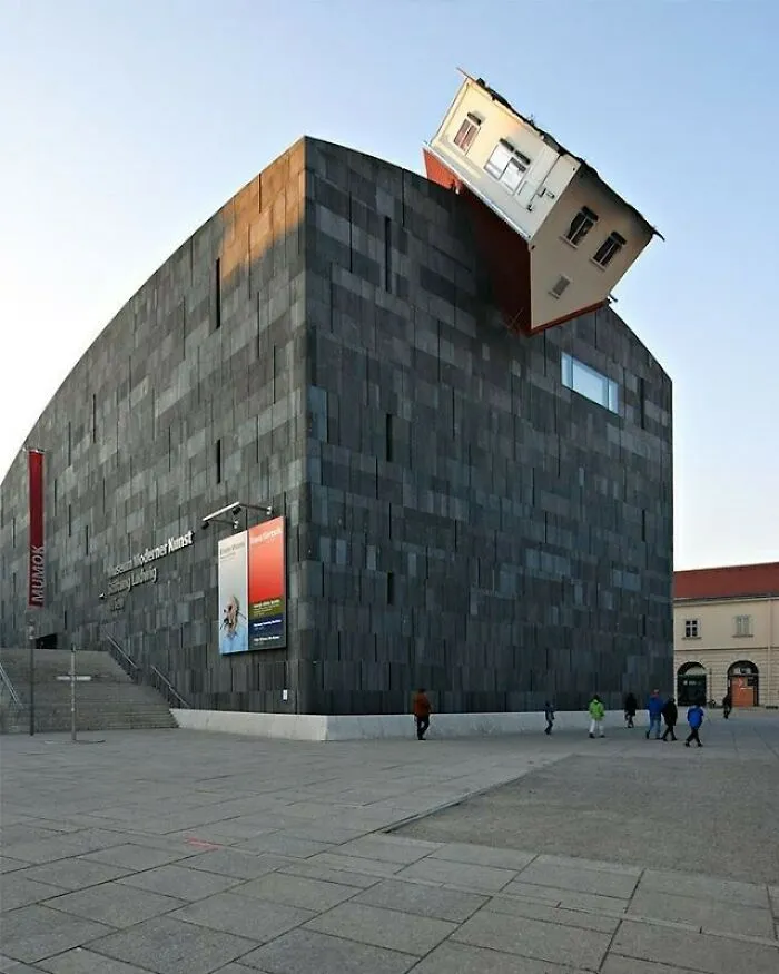House Attack art installation on MUMOK building, showing how bizarre shapes redefine ordinary architecture