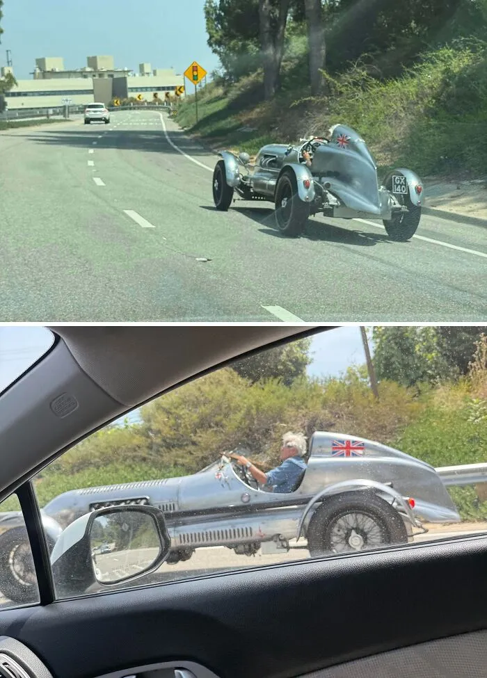 Silver vintage race car driving down a highway, showcasing wonderful vehicles from past eras.