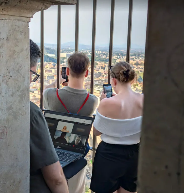 A person attending a video call on a laptop outdoors where things went wrong with virtual meetings