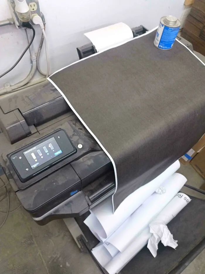 A printer displaying an error message about ink levels, depicting things went wrong with printing.