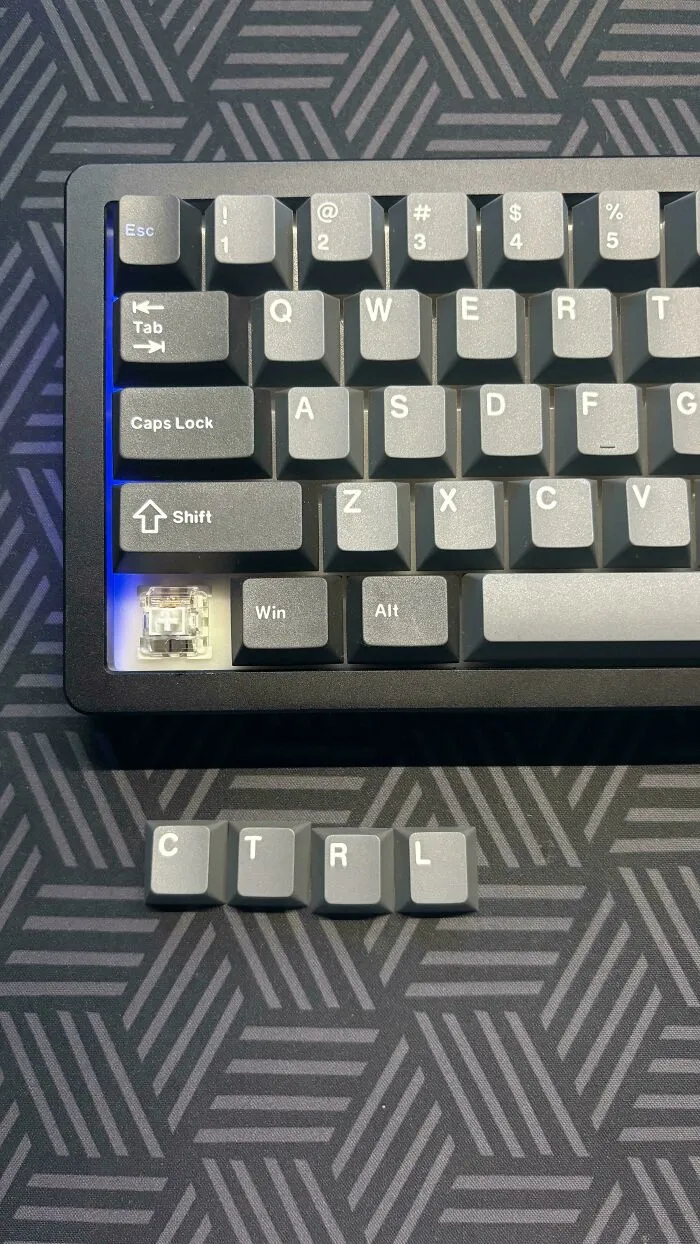 A keyboard missing its control key, spell out C-T-R-L separately, showcasing things went wrong with setup.