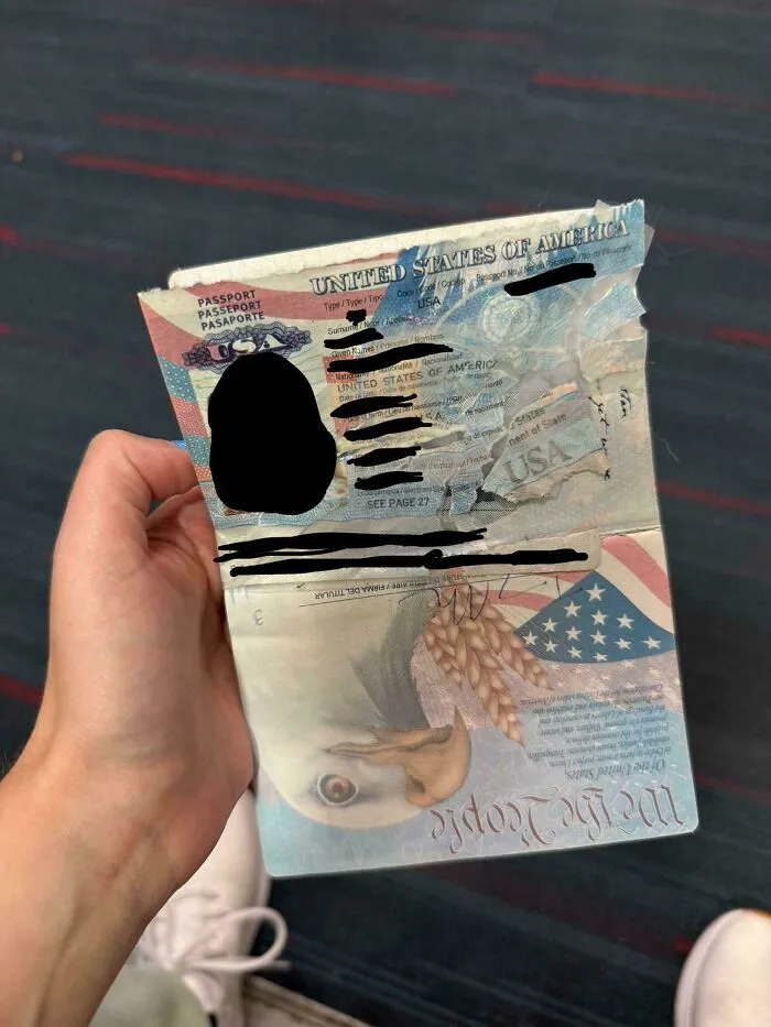 A damaged US passport with torn edges showing things went wrong