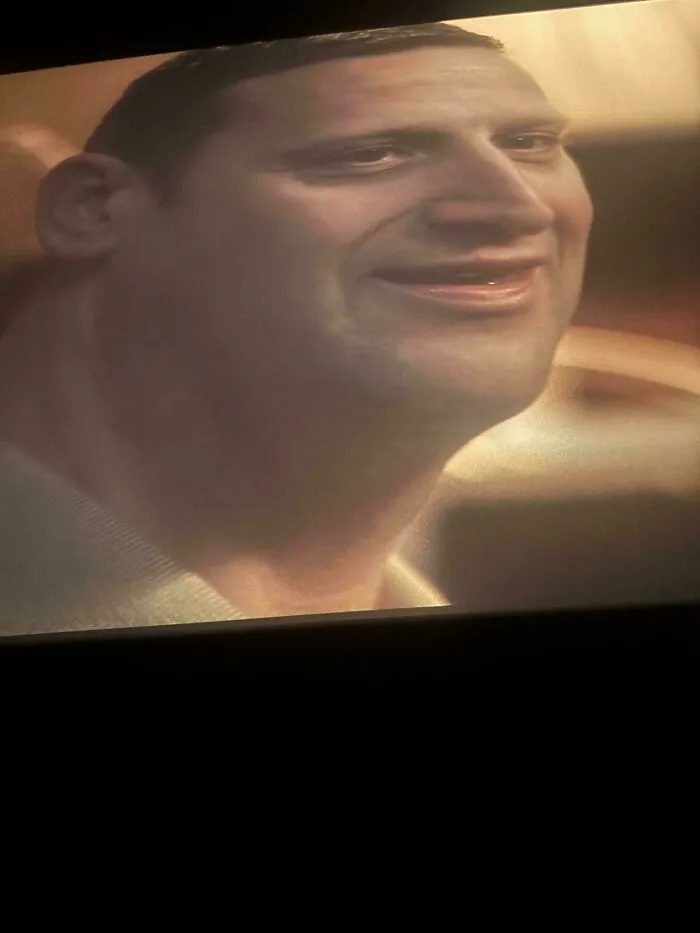 Distorted man face on TV screen representing things went wrong.