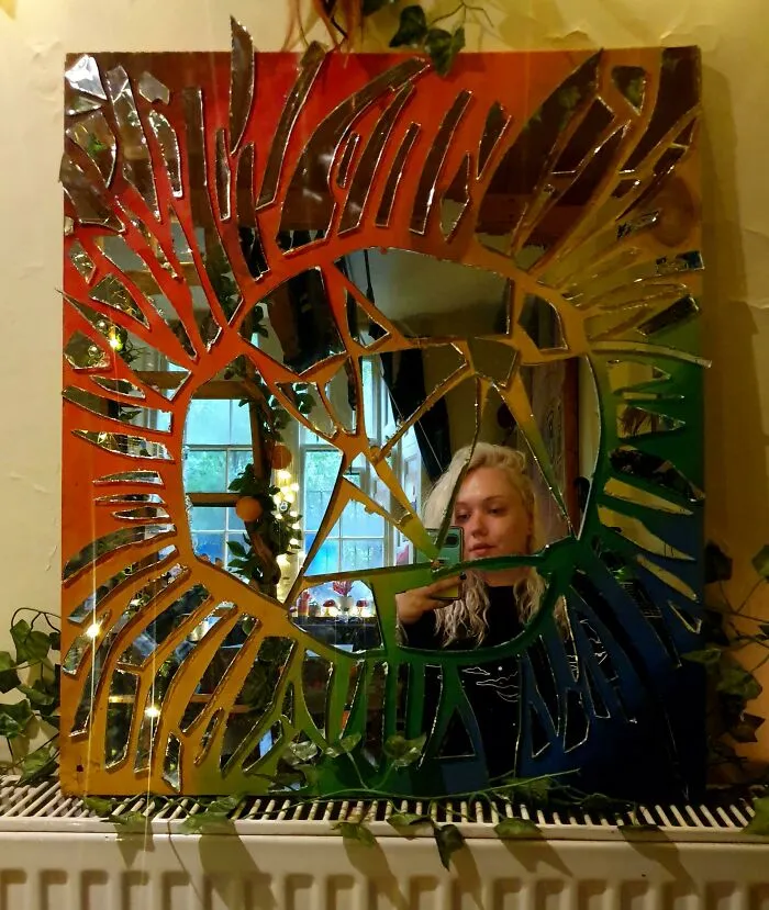 Creative DIY projects showing a colorful mosaic mirror made from shattered glass pieces