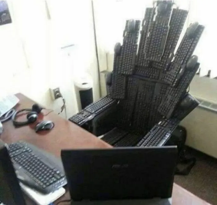 Creative DIY Projects office chair made entirely of computer keyboards and computer mice.