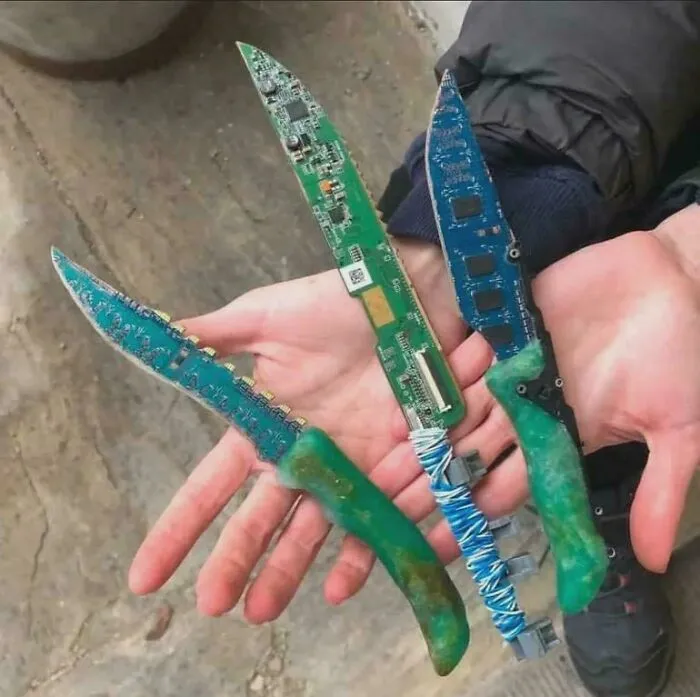 A set of three handmade DIY project knives crafted from green resin and recycled computer circuit boards
