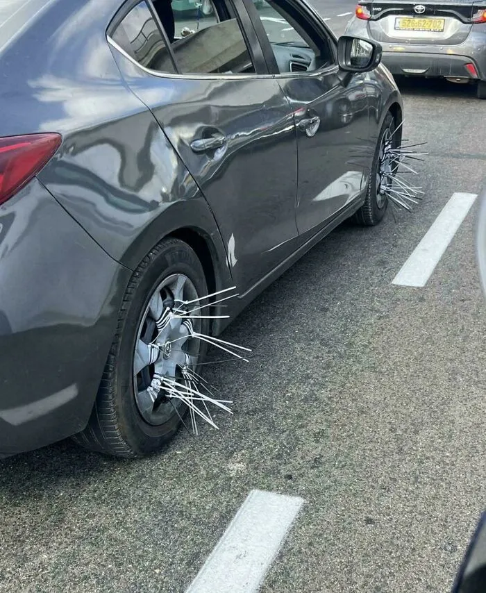 Hilarious DIY Projects fail with zip ties attached to car wheel rims to prevent hubcap theft.