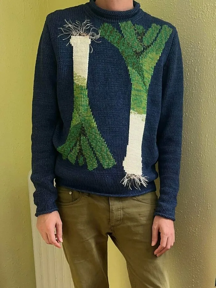 A unique blue sweater with leeks showcasing knitting skills