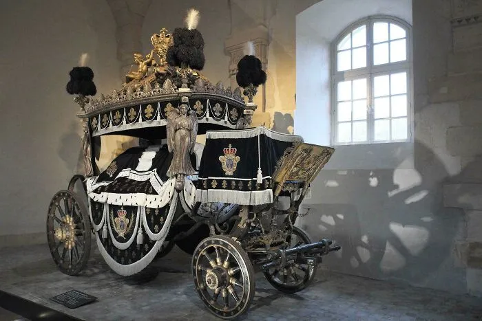 Historical treasures ornate funeral carriage from 200 years ago.