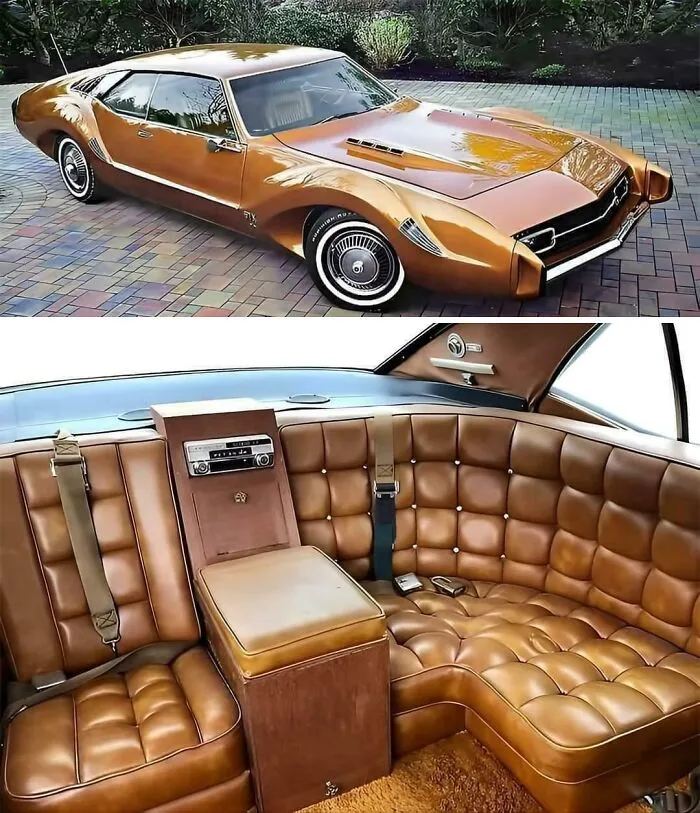 Bronze vintage custom car with a plush leather wrap-around interior, showcasing wonderful vehicles.