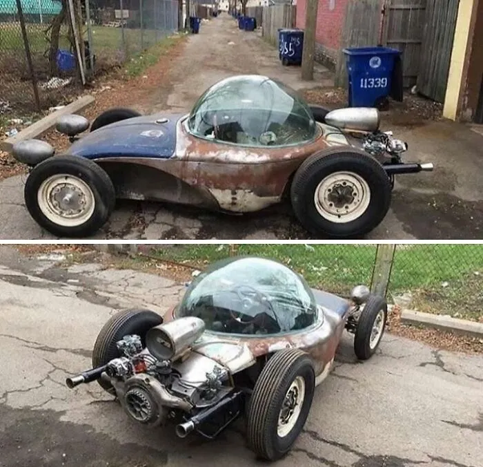 A custom rusty bubble-top car parked in an alley, exemplifying weird and wonderful vehicles.