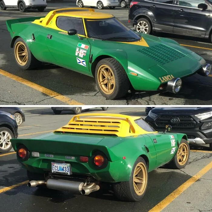 A bright green and yellow Lancia Stratos rally car parked in a lot, showcasing weird and wonderful vehicles.
