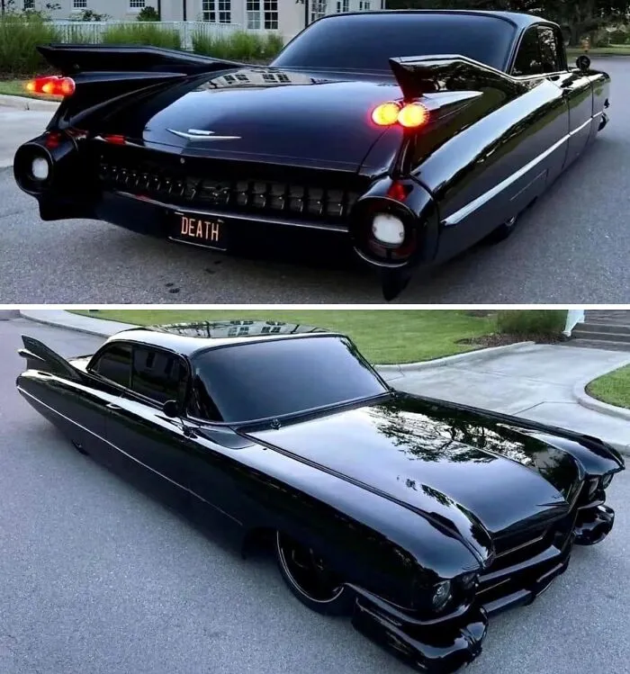Front and rear view of a customized all-black vintage Cadillac with tail fins.