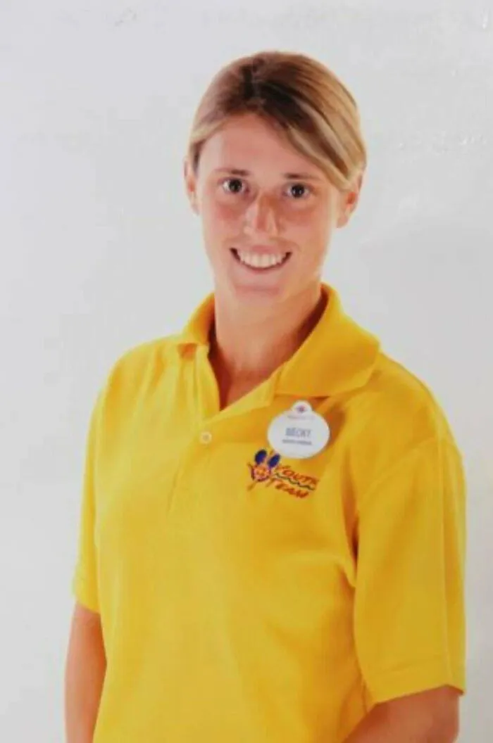 A woman in a yellow shirt smiling, related to creepy mysteries from around the web.