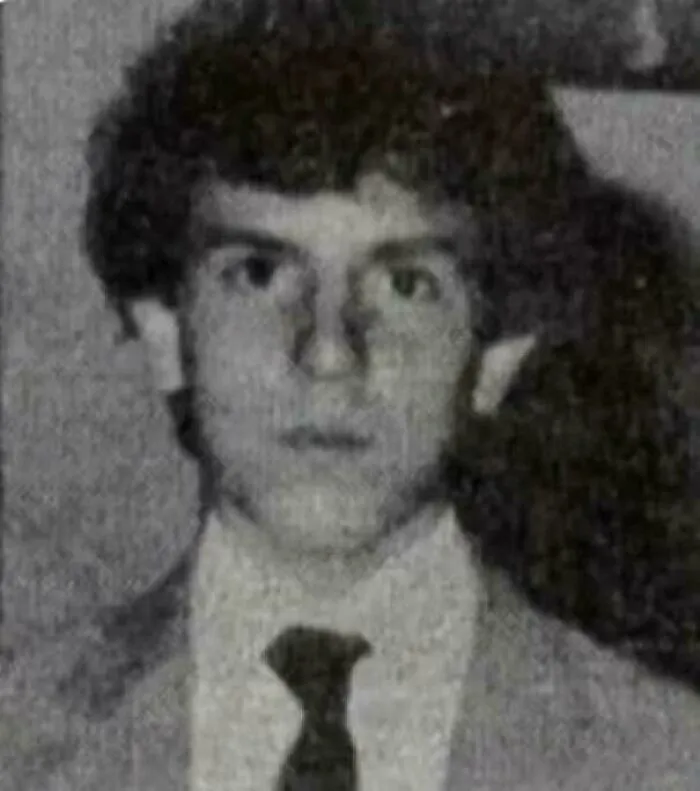 A grainy black and white portrait of a young man, connected to creepy mysteries.