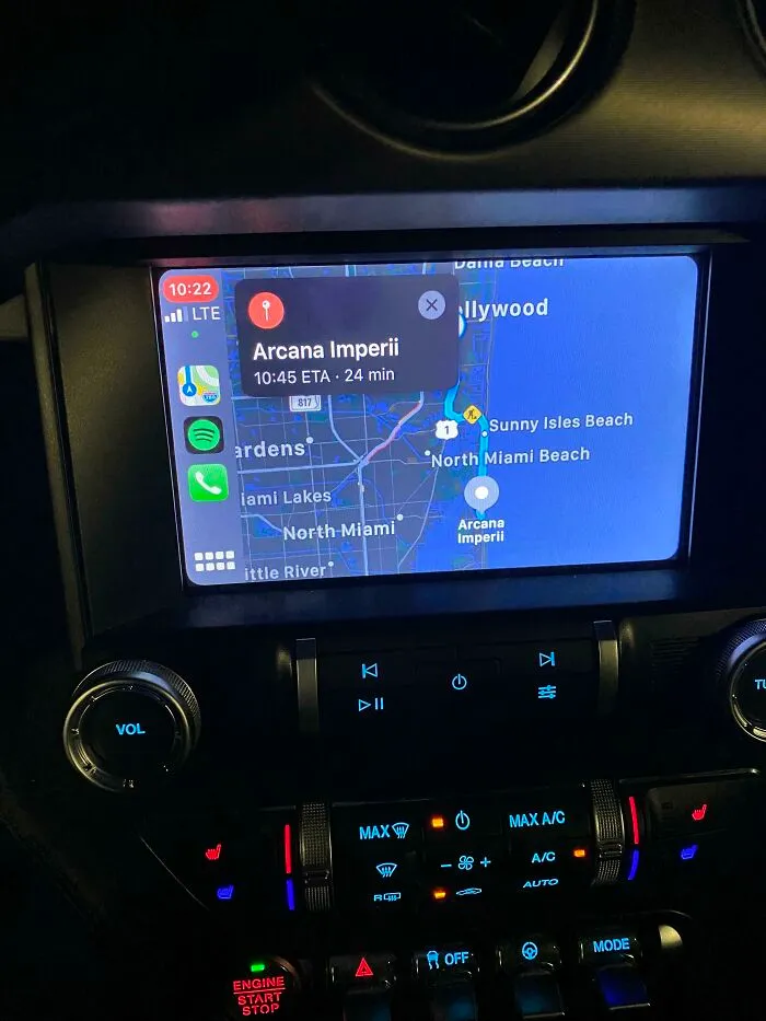 Car dashboard display showing GPS navigation route, tied to weird online mysteries