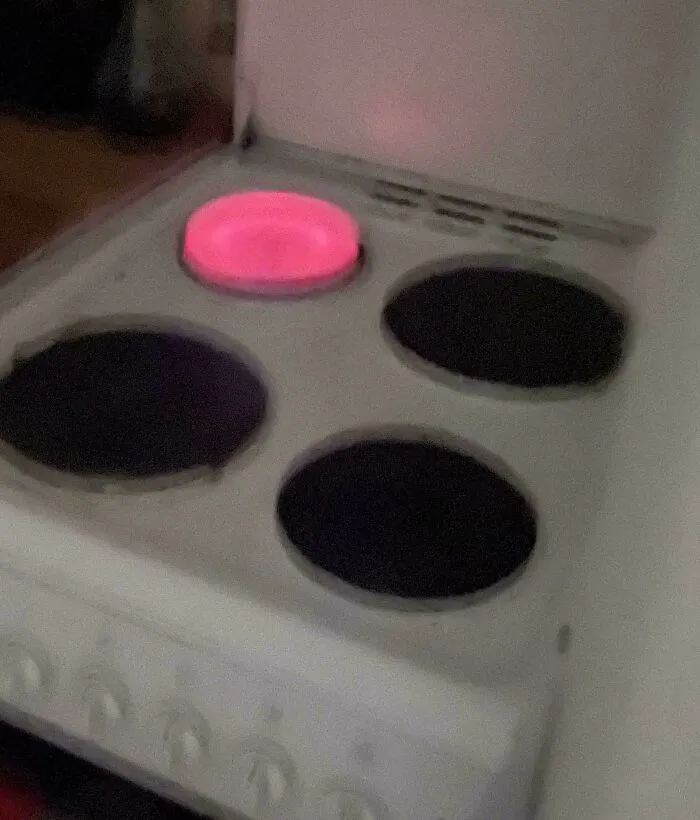 A stove burner left glowing hot and unattended, highlighting frustrating roommate stories.
