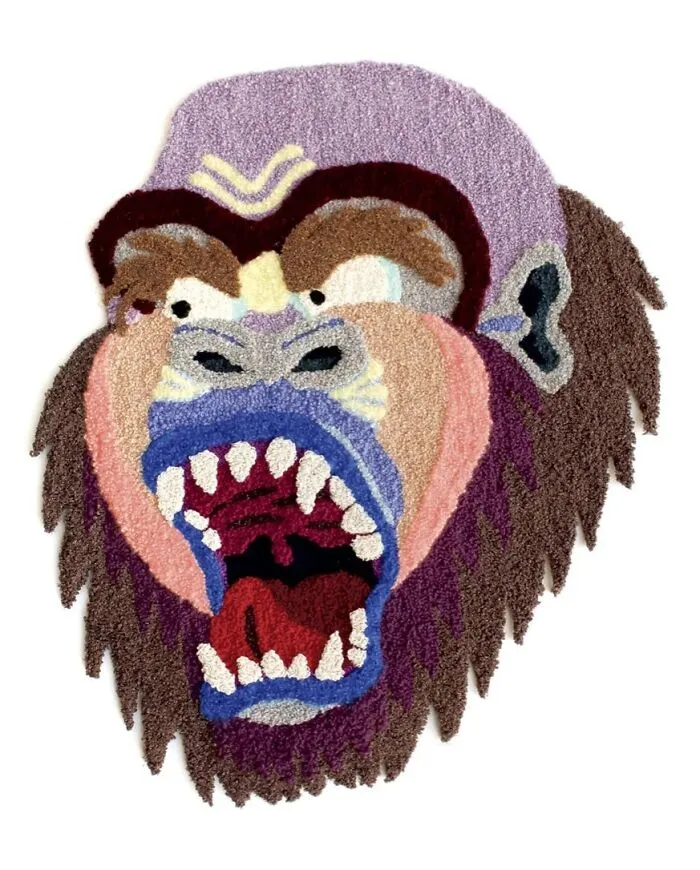 Detailed close-up of a roaring gorilla rug design handcrafted by artist Ina Dyreborg.