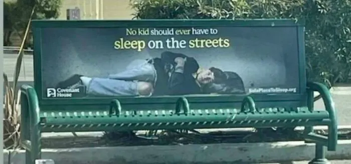 Public bench design preventing the homeless from lying down, reflecting issues of modern life in America.