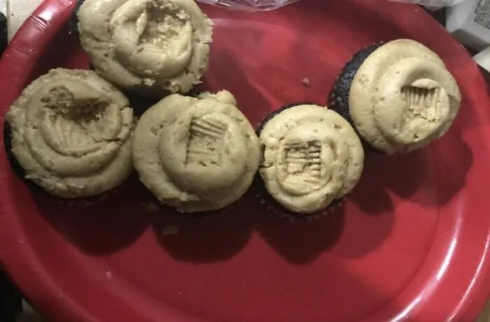 Frosting on cupcakes with bite marks on top, showing annoying roommate stories.
