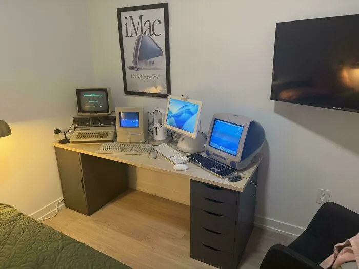 A desk with several classic Apple Macintosh computers, representing vintage tech finds