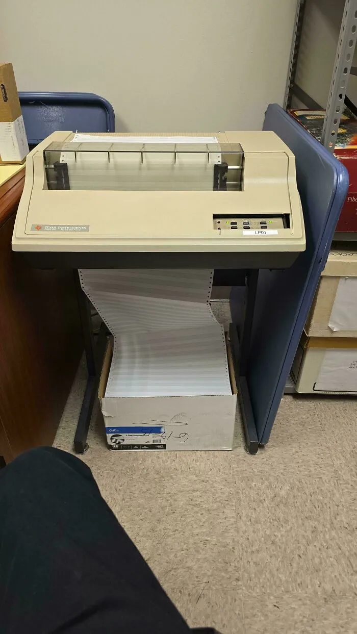 Texas Instruments continuous paper printer, representing vintage tech finds