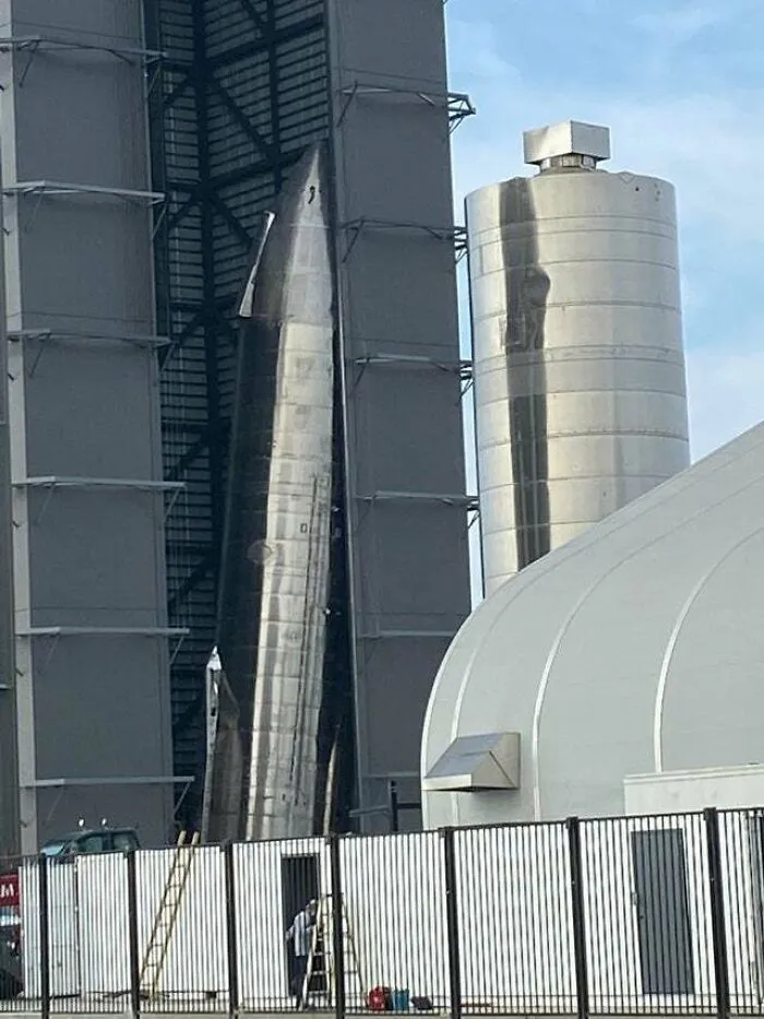 A damaged industrial silo in a facility, depicting expensive accidents.