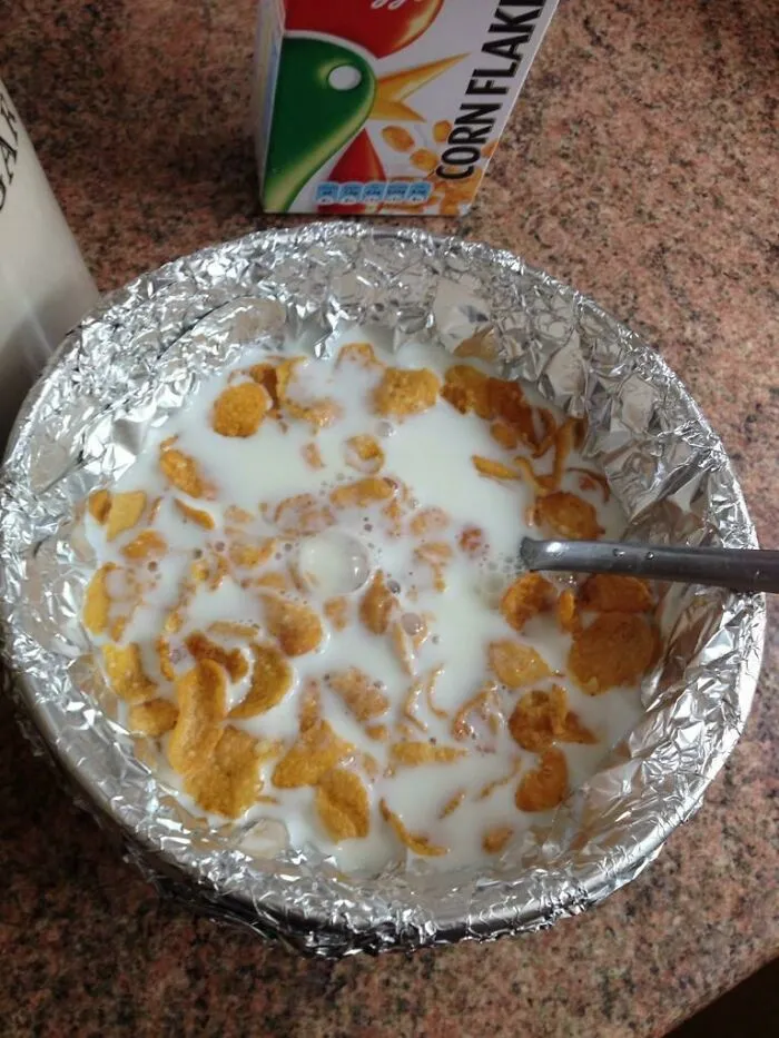 Corn flakes inside a bowl lined with aluminum foil as one of many clever redneck fixes.