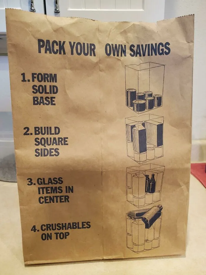 A brown paper grocery bag featuring a clever design with packing instructions.