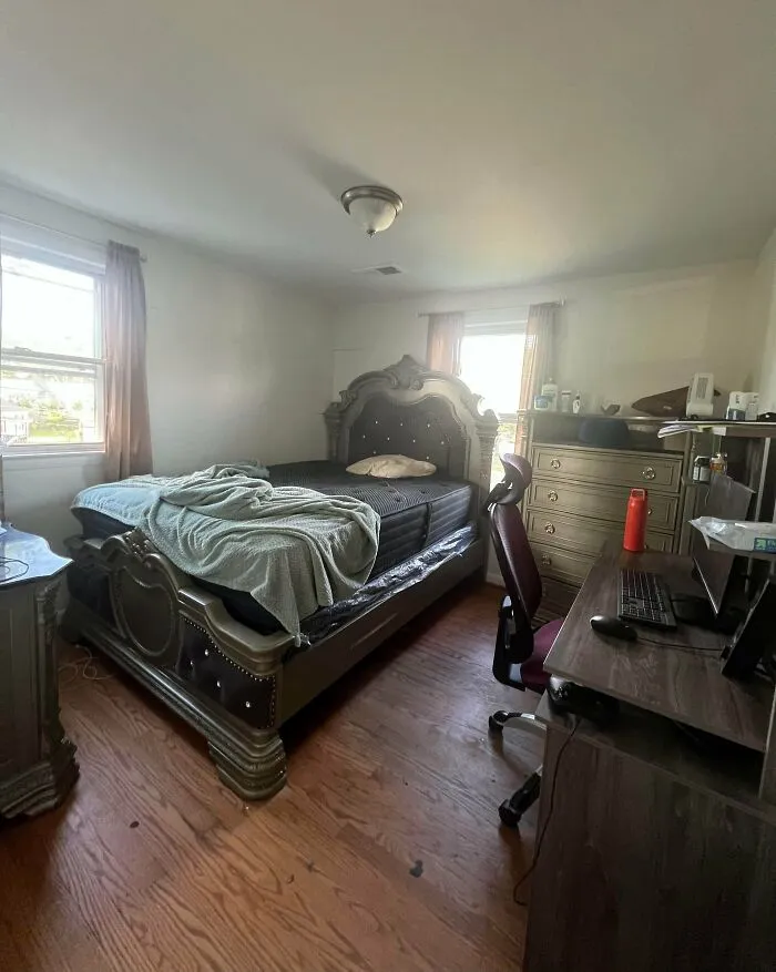 Cramped bedroom showing a questionable interior design choice with oversized furniture.