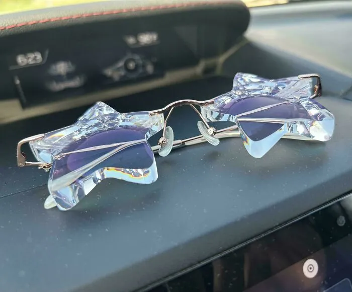 Clever ideas star-shaped cut-crystal glasses reflecting light in a car interior