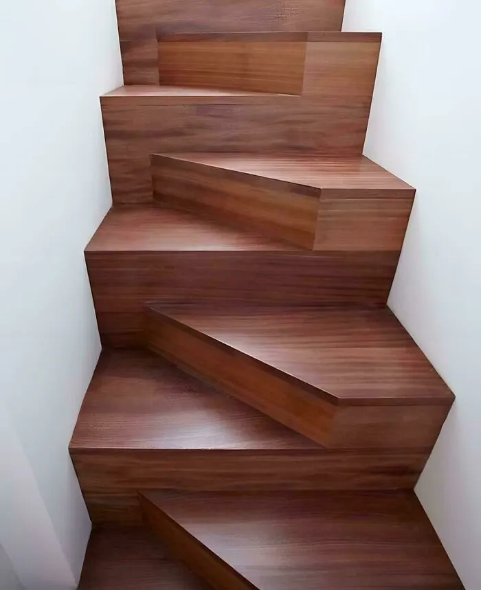 Unusual modern wooden staircase showcasing a strange interior design decision