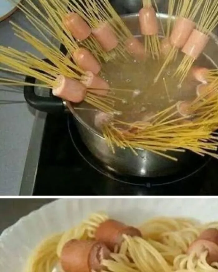 Odd photo showing uncooked spaghetti threaded through sliced sausages being boiled in a pot.