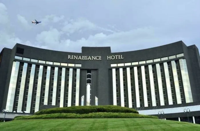 The Renaissance Hotel sign displays incorrect letter spacing, highlighting common typography fails.