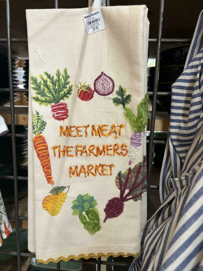 Embroidery on kitchen towel showing bad letter spacing as typography fails example