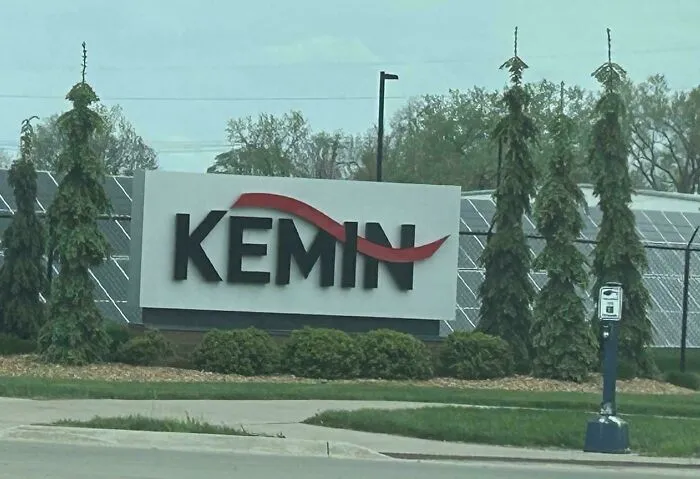 Corporate Kemin sign showcasing bad letter spacing that looks like KEMIN