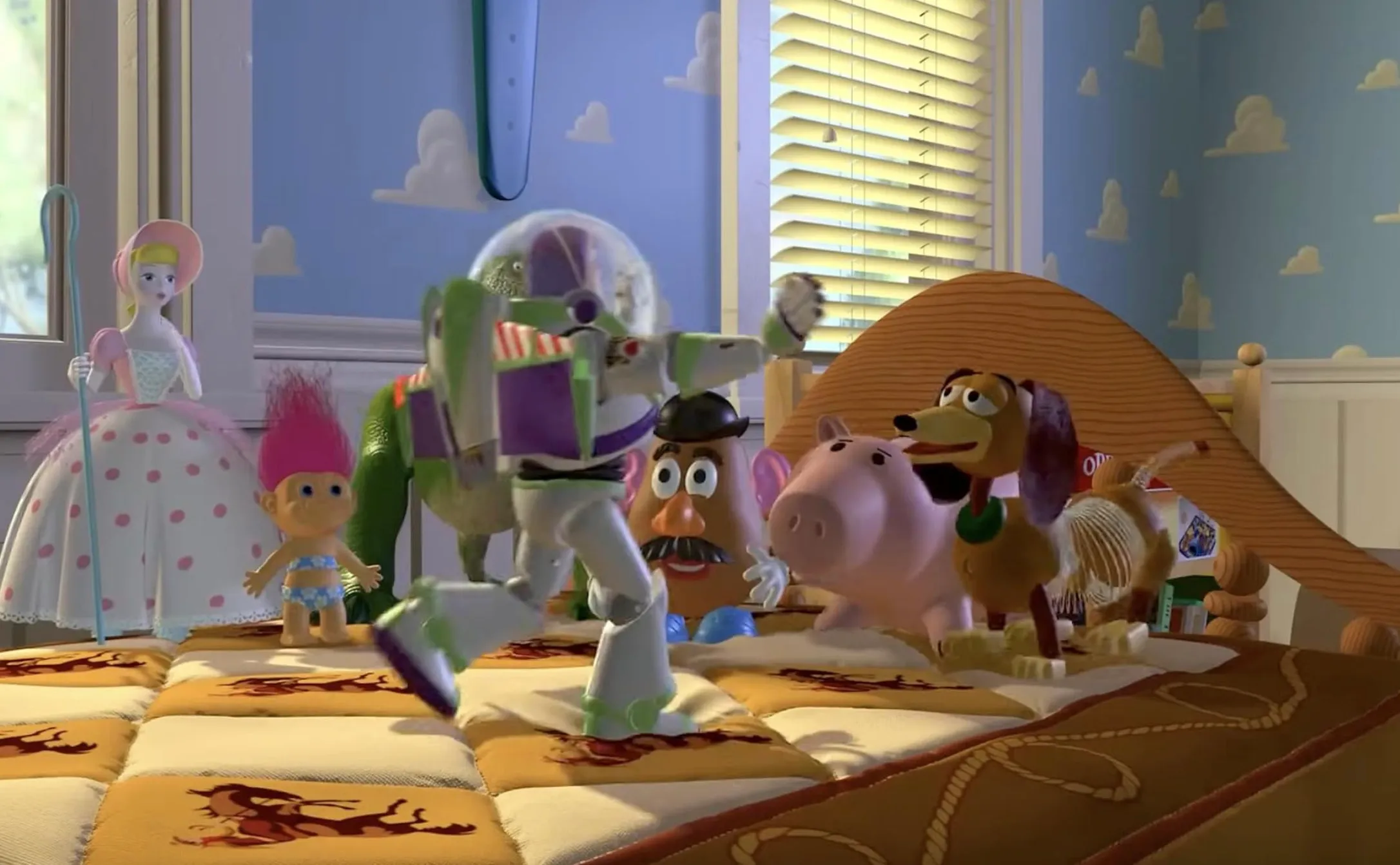 Toy Story characters on a bed, referencing the pub quiz question about To infinity and beyond.