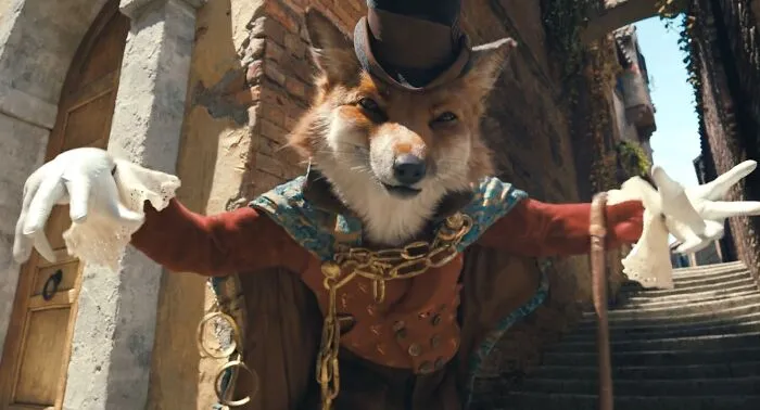 Puppet of a fox in a top hat and gloves, showcasing intricate movie props.