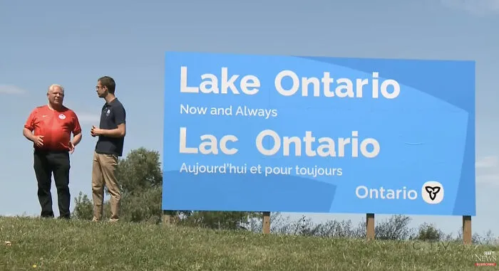 A large blue sign for Lake Ontario showing bad letter spacing as a classic typography fail