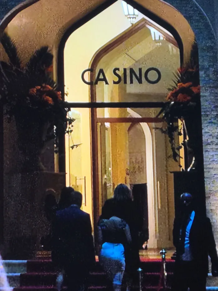 The entrance of a building with CA SINO written above, illustrating noticeable typography fails.
