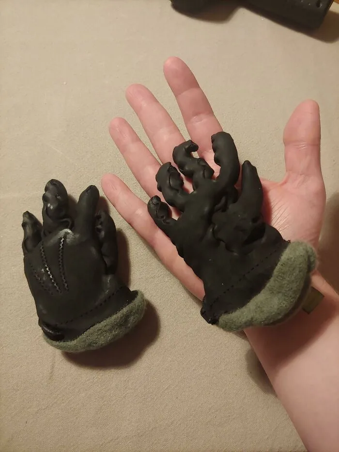 A pair of leather gloves shrunken to a miniature size, showcasing questionable decisions