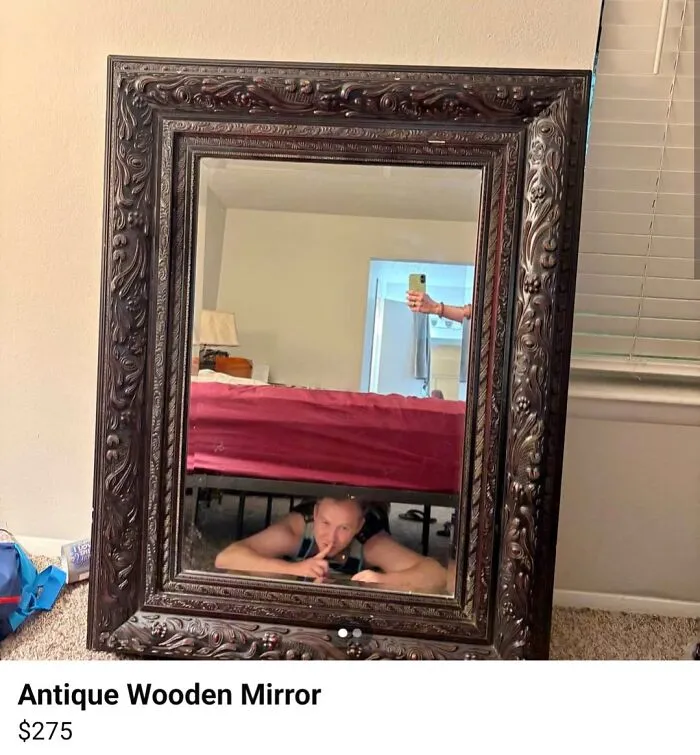 Hilarious mirror pic for a wood mirror listing with a person hiding under a bed shushing the camera.