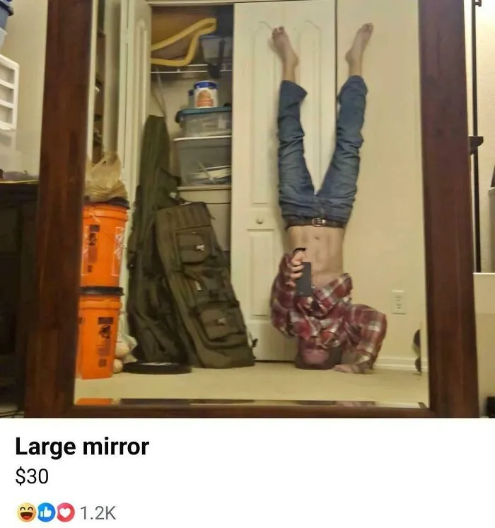 Hilarious mirror pics of a person doing a headstand to take a selfie.