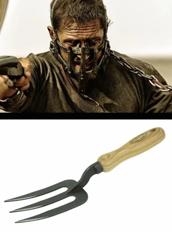Character in mask next to a garden hand fork, demonstrating creative movie props.