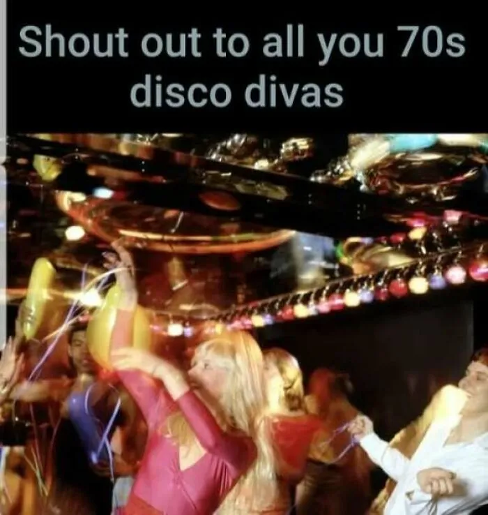 Partygoers celebrating on a crowded dance floor in energetic 70s photos of disco divas.