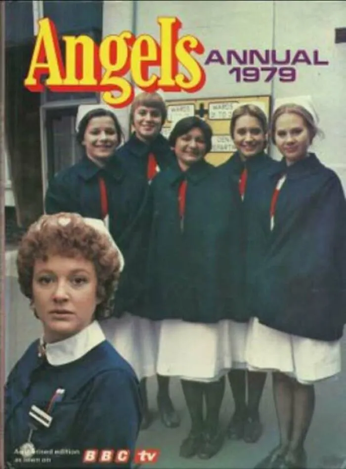 Cover of 1979 Angels annual featuring a group of girls in navy and red uniforms