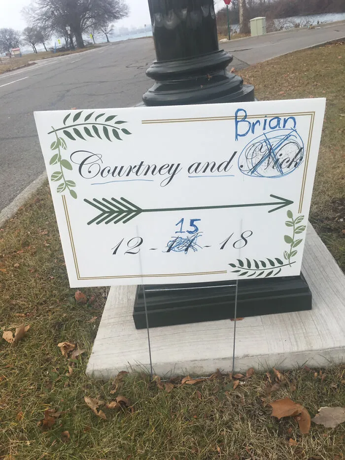 A wedding sign with names and dates crossed out and rewritten, highlighting questionable wedding moments.