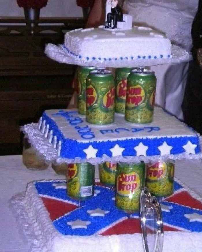 Questionable wedding cake stacked on Sun Drop soda cans featuring a Confederate flag design.