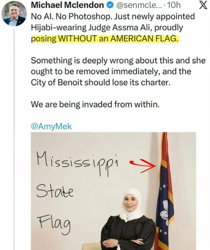Newly appointed hijabi judge posing without an American flag in Mississippi