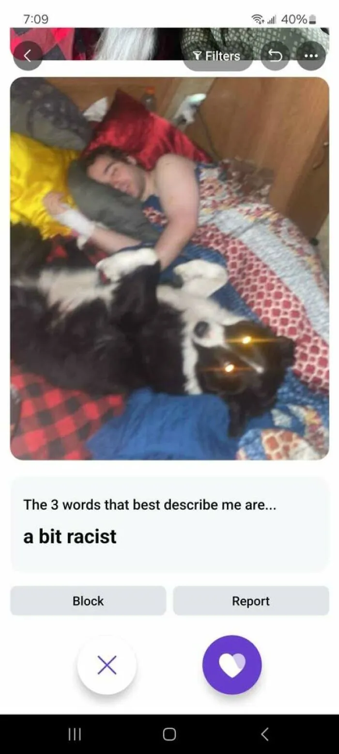 Screenshot of a bad dating profile photo featuring a man sleeping next to a dog.